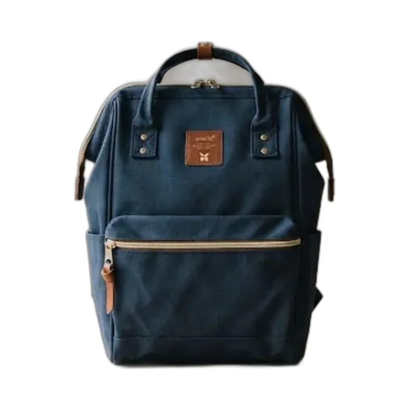 Navy Anello backpack standing upright